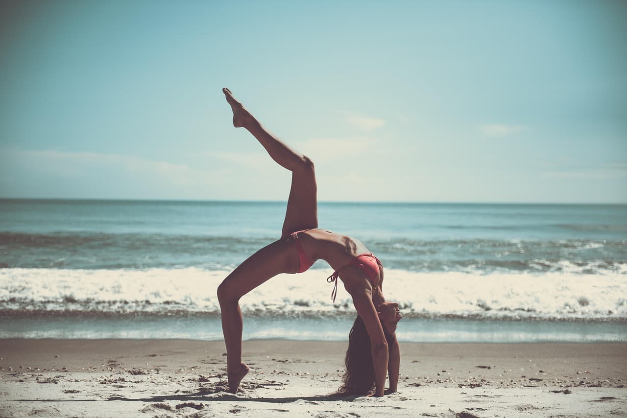 beach, yoga, athlete, sportive, skinny, slim, ocean, woman, nature, relaxation, sand, sea, seashore, tropical, water, exercise, stretching, flexible [pid:1853902][light]